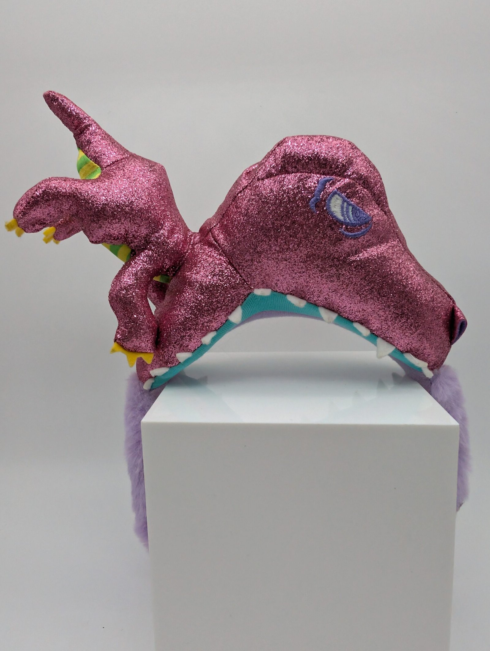 Universal Studios: Jurassic Park – Diadema Tiranosaurio Rex Rosado